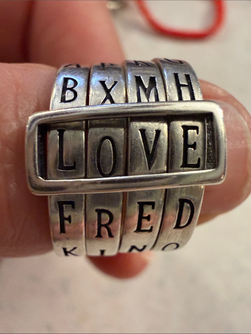 .925 LOVE Spinner Ring with Letter Bands